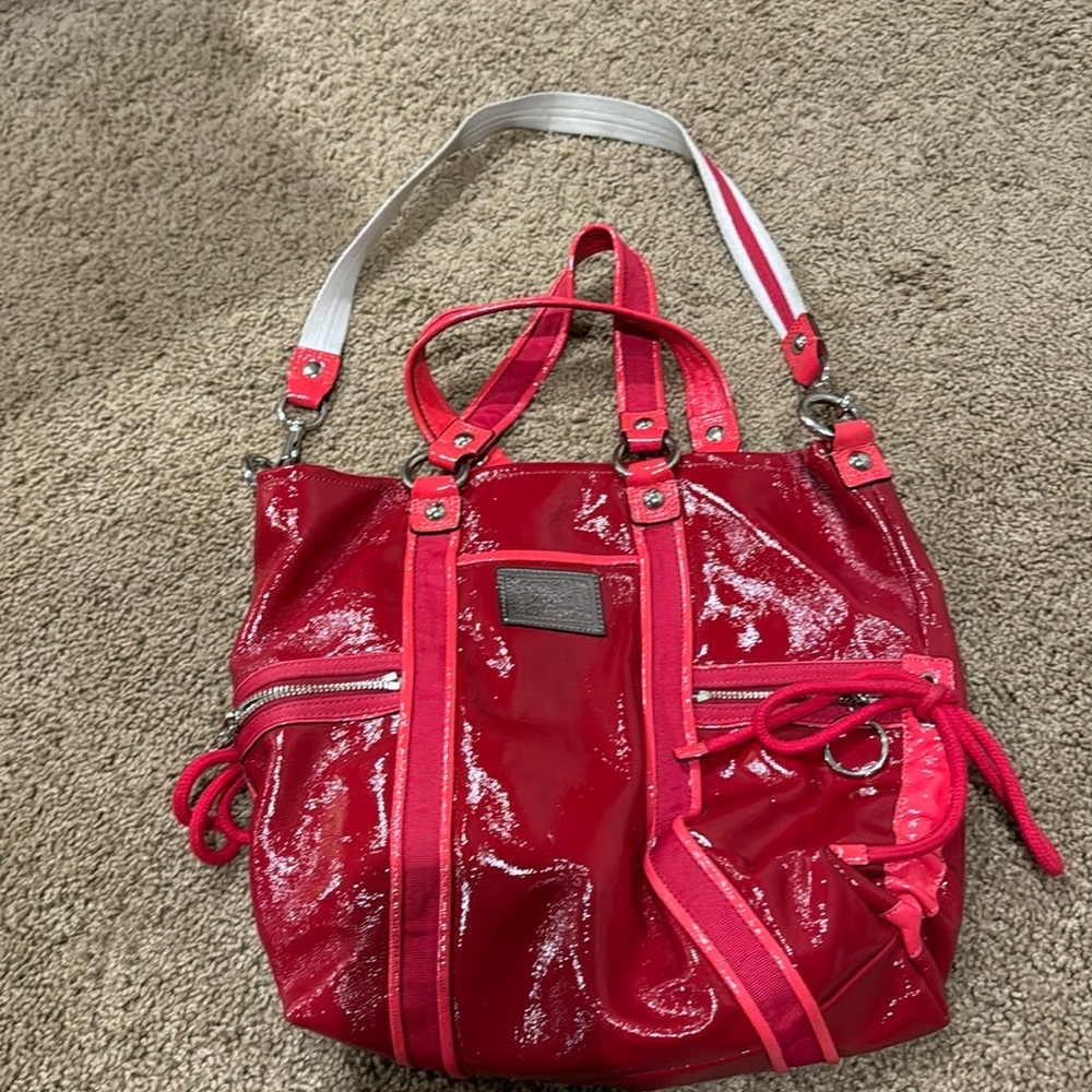 Beautiful red authentic Coach poppy purse. Gently used in excellent condition.